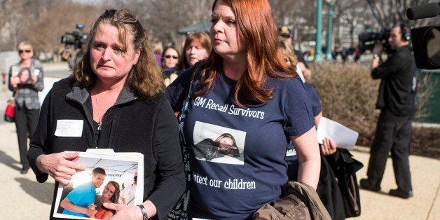 UNITED STATES - APRIL 1: From left, Cherie Sharkey, whose son died in a Chevy Cobalt crash in 2012, and Laura Christian, whose daughter died in Chevy Cobalt crash in 2005, arrive for a news conference on GM's defective ignition outside the U.S. Capitol on Tuesday, April 1, 2014. Family members who lost loved ones in Chevy Cobalt crashes joined Senators and House members for the news conference before the House's hearing on GM. (Photo By Bill Clark/CQ Roll Call)