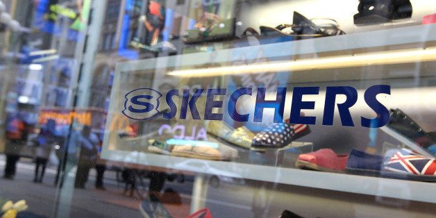 NEW YORK, NY - MAY 16: The Skecher logo is seen in the window of a Skechers store on May 16, 2012 in New York City. The Federal Trade Commission announced that Skechers has agreed to pay $40 million to settle charges of misleading consumers with claims that their toning sneakers would provide health and fitness benefits, including losing weight, without ever going to a gym. (Photo by Justin Sullivan/Getty Images)