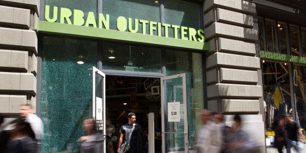 Pedestrians walk past the Urban Outfitters Inc. store in San Francisco, California, U.S., on Thursday, Aug. 11, 2011. Retail sales in the U.S. climbed in July by the most in four months, showing consumers are holding up even as employment slows. Photographer: David Paul Morris/Bloomberg via Getty Images
