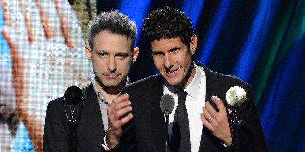 CLEVELAND, OH - APRIL 14: Inductees Adam Horovitz AKA ADROCK (L) and Michael Diamond AKA Mike D (R) of the Beastie Boys speak on stage at the 27th Annual Rock And Roll Hall Of Fame Induction Ceremony at Public Hall on April 14, 2012 in Cleveland, Ohio. (Photo by Jeff Kravitz/FilmMagic)