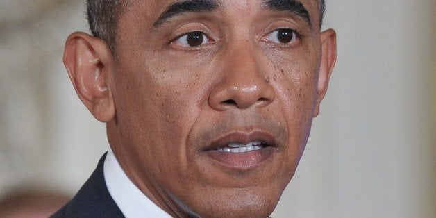 US President Barack Obama speaks before signing a memorandum on reducing the burden of student loans on June 9, 2014 in the East Room of the White House in Washington, DC. AFP PHOTO/Mandel NGAN (Photo credit should read MANDEL NGAN/AFP/Getty Images)