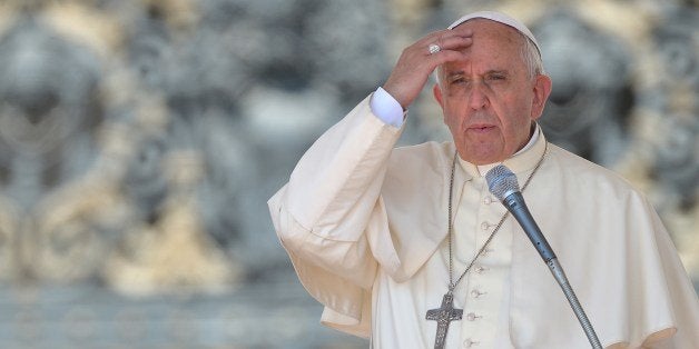 Pope Francis speaks during his general audience at St Peter's square on June 11, 2014 at the Vatican. AFP PHOTO / VINCENZO PINTO (Photo credit should read VINCENZO PINTO/AFP/Getty Images)