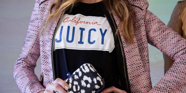 NEW YORK, NY - OCTOBER 08: A model poses (bag detail) during the Juicy Couture spring 2014 presentation at Milk Studios on O
