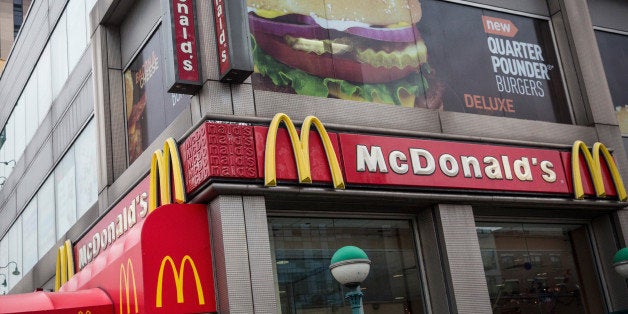 NEW YORK, NY - JUNE 09: A sign for a McDonald's restaurant is seen on June 9, 2014 in New York City. McDonald's domestic sales fell slightly in May, marking one of the longest streches without U.S. growth. (Photo by Andrew Burton/Getty Images)