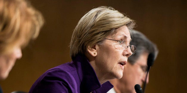 Senator Elizabeth Warren (D-MA) speaks during a hearing of the Senate Banking, Housing and Urban Affairs Committee on Capitol Hill November 14, 2013 in Washington, DC. Janet Yellen, the Vice Chair of the Board of Governors of the Federal Reserve System, appeared before the committee for a confirmation hearing to replace Ben S. Bernanke as the chairman of the Federal Reserve. AFP PHOTO/Brendan SMIALOWSKI (Photo credit should read BRENDAN SMIALOWSKI/AFP/Getty Images)