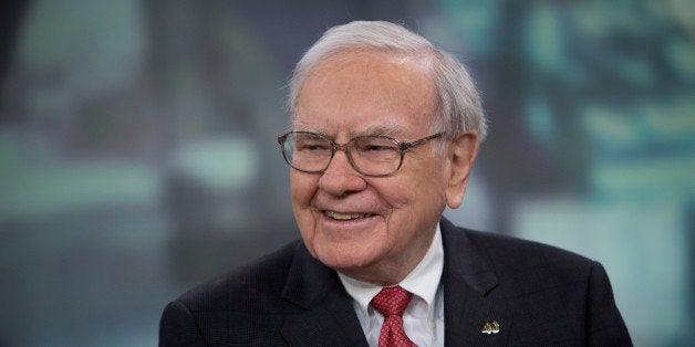 Warren Buffett, chairman and chief executive officer of Berkshire Hathaway Inc., speaks during an interview in New York, U.S., on Tuesday, Oct. 22, 2013. Warren Buffett and his late first wife, Susan, gave and pledged billions to each of their three children to fund charitable foundations. Howard, an Illinois farmer, picked global hunger as his target. Photographer: Scott Eells/Bloomberg via Getty Images 