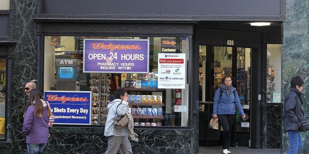 SAN FRANCISCO, CA - JUNE 19: People walk by a Walgreens store on June 19, 2012 in San Francisco, California. U.S. based drug store chain Walgreens has announced a deal to purchase a 45 percent stake in European pharmacy retailer Alliance Boots for $6.7 billion. The acquisition will make Walgreens one of the world's largest drug store and pharmacy retailers with 11,000 stores in 12 countries. (Photo by Justin Sullivan/Getty Images)