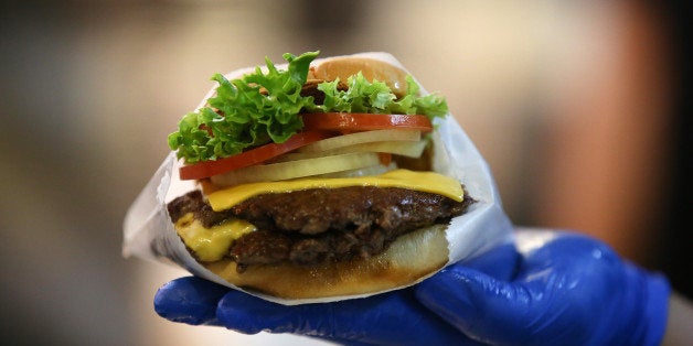 A ShackBurger is seen in this arranged photograph at the first Shake Shack burger restaurant to open in Moscow, Russia, on Tuesday, Dec. 24, 2013. The New York burger joint known for its queues will sell ShackBurgers for 235 rubles ($7.15), about 50 percent more than in New York and almost triple the price of a local Big Mac. Photographer: Andrey Rudakov/Bloomberg via Getty Images