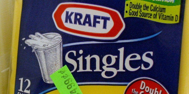 UNITED STATES - JANUARY 31: Kraft Singles American cheese, manufactured by Altria Group Inc., is displayed in a store in New York, on Wednesday, January 31, 2007. Altria Group Inc., parent of the world's largest cigarette maker, will spin off Kraft Foods Inc. on March 30, saying the unit will grow more quickly as a independent company. (Photo by John Marshall Mantel/Bloomberg via Getty Images)