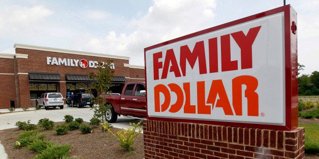 FILE - This Tuesday, Aug. 19, 2014 photo shows the Family Dollar store in Ridgeland, Miss. Dollar General is boosting its bid for rival Family Dollar to approximately $9.1 billion and says it's now willing to more than double the number of stores it would shed to avoid trouble with regulators. Dollar General Corp. said Tuesday, Sept. 2, 2014, it will now divest 1,500 stores to steer clear of antitrust issues.(AP Photo/Rogelio V. Solis, File)