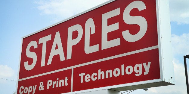 ELMWOOD PARK, IL - MAY 20: A sign hangs outside a Staples store which is scheduled to close next month on May 20, 2014 in Elmwood Park, Illinois. Shares of Staples' stock plunged more than 10% today after the company reported a 43.5 percent drop in first quarter profit, far short of expectations. (Photo by Scott Olson/Getty Images)