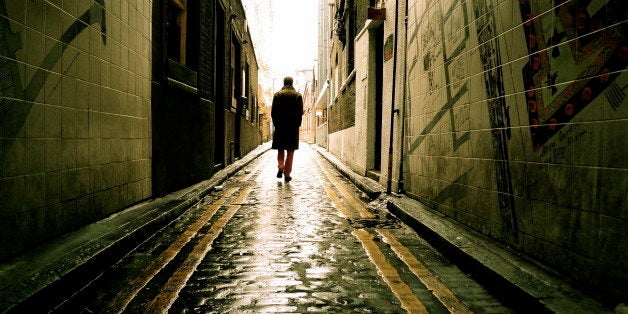 December 30th, 2009 - Whitechapel, London, EnglandI could try to imbue this image with some sort of appropriate New Year's symbolism - say it represents a young man walking towards a brighter future, or something like that. Or I could just thank the photography gods for presenting me with the perfect Flickr-friendly combination of rain-glistening cobbles, a silhouette in a long coat and a vanishing point.Happy reveling !! See you in 2010 !!I think it's worth clicking here to view large on black.