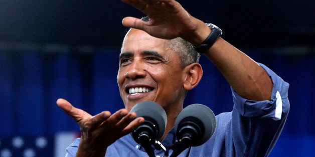 President Barack Obama gestures as he speaks at Laborfest 2014 at Henry Maier Festival Park in Milwaukee on Labor Day, Monday, Sept. 1, 2014. (AP Photo/Charles Dharapak)