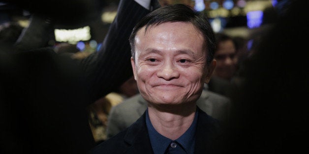 Billionaire Jack Ma, chairman of Alibaba Group Holding Ltd., tours the floor of the New York Stock Exchange (NYSE) in New York, U.S., on Friday, Sept. 19, 2014. Alibaba Group Holding Ltd., the e-commerce company started in 1999 with $60,000 cobbled together by Jack Ma, is set to debut in U.S. trading today after raising $21.8 billion in its initial public offering. Photographer: Scott Eells/Bloomberg via Getty Images 