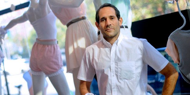 Dov Charney, chairman and chief executive officer of American Apparel Inc., stands for a portrait in a company retail store in New York, U.S., on Thursday, July 29, 2010. Starting the company in a dorm at Tufts University in Medford, Massachusetts, Charney built a worldwide empire of 280 clothing stores by leaping out ahead of mainstream fashion. He personified the racy, risk-taking aesthetics of his business and is now facing the consequences - skittish lenders and investors who doubt his ability to oversee his own creation. Photographer: Keith Bedford/Bloomberg via Getty Images