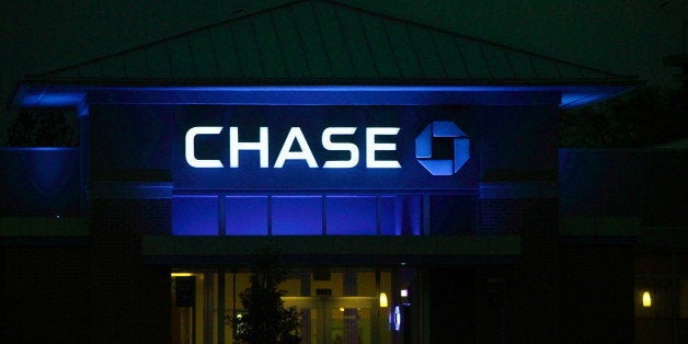 Glows blue at night...(Chase Bank upper facade bathed in blue light...)