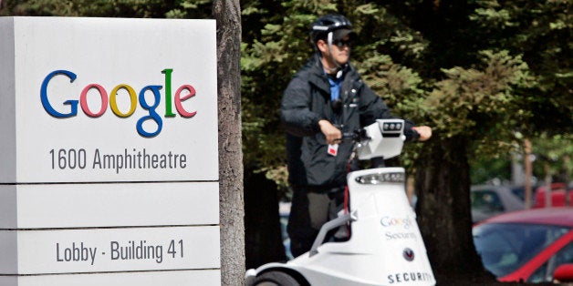 A Google security guard rides a vehicle in front of Google headquarters in Mountain View, Calif., Wednesday, May 7, 2008. It'
