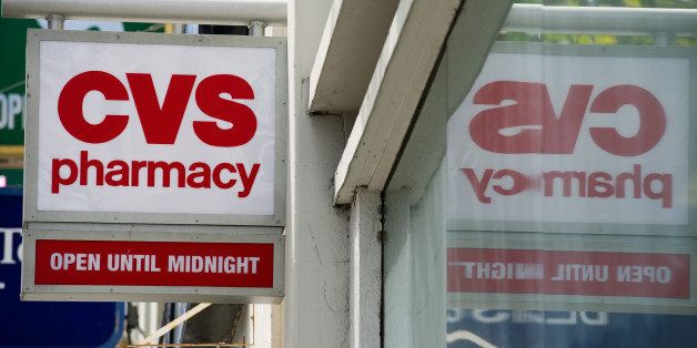 CVS Caremark Corp. signage is seen on the facade of a store in San Francisco, California, U.S., on Wednesday, Aug. 3, 2011. CVS Caremark Corp., the largest provider of prescription drugs in the U.S., is expected to announce earnings on Aug. 4. Photographer: David Paul Morris/Bloomberg via Getty Images
