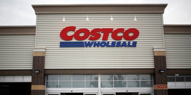 A man enters a Costco Wholesale Corp. store in Louisville, Kentucky, U.S., on Thursday, May 29, 2014. Costco Wholesale Corp.,