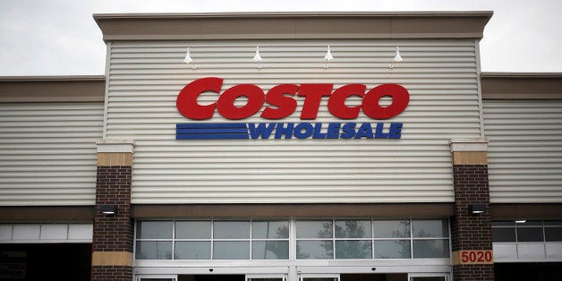 A man enters a Costco Wholesale Corp. store in Louisville, Kentucky, U.S., on Thursday, May 29, 2014. Costco Wholesale Corp., the largest U.S. warehouse-club chain, posted fiscal third-quarter profit that missed analysts' estimates even as comparable sales gained 6 percent. Photographer: Luke Sharrett/Bloomberg via Getty Images