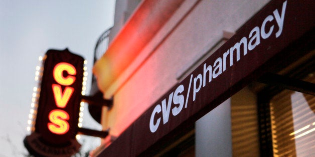 A CVS Pharmacy is seen in Orlando, Fla., Wednesday, Feb. 2, 2011. Drugstore chain and pharmacy benefits manager CVS Caremark Corp. said Thursday, Feb. 3, that its profit fell 2 percent in the fourth quarter on lower revenue because of client losses and fewer Medicare prescription drug program members.(AP Photo/John Raoux)