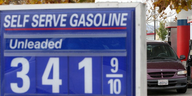 SAN RAFAEL, CA - OCTOBER 15: Gas prices are displayed at a gas station on October 15, 2014 in San Francisco, California. According to AAA, the average retail price of gasoline has fallen 20 cents in the past month dropping the national average for a gallon of regular gasoline to $3.19. The national average is expected to drop below $3.00 per gallon by the end of the year. (Photo by Justin Sullivan/Getty Images)