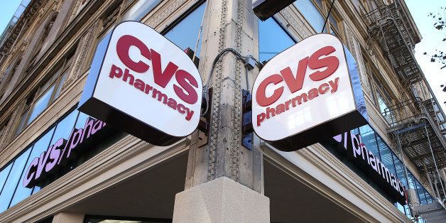 SAN FRANCISCO, CA - NOVEMBER 05: Signs are posted outside of a CVS store on November 5, 2013 in San Francisco, California. CVS Caremark reported a 25 percent surge in third-quarter earnings with profits of $1.25 billion, or $1.02 per share, compared to $1.01 billion, or 79 cents a share one year ago. (Photo by Justin Sullivan/Getty Images)