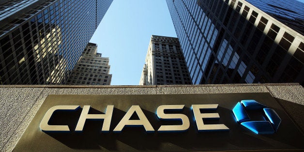 NEW YORK, NY - OCTOBER 14: A sign hangs on One Chase Plaza in lower Manhattan on October 14, 2014 in New York City. JPMorgan Chase, the nation's largest bank, reported third-quarter net income of $5.6 billion, or $1.36 per share, returning the bank to third quarter profitability. (Photo by Spencer Platt/Getty Images)