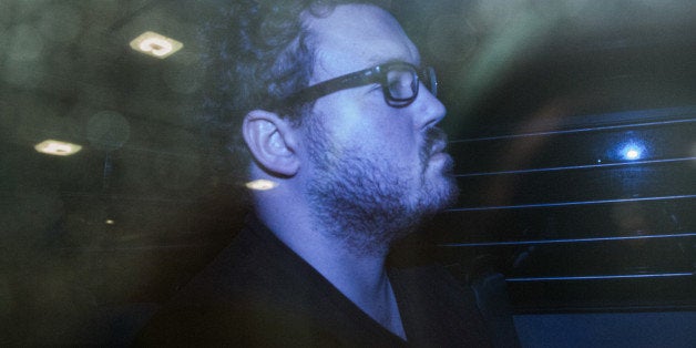 Rurik George Caton Jutting, a former Bank of America Corp. employee, leaves the Eastern Magistrates Court in a prison van in