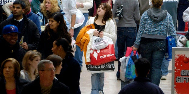 ** FILE ** Shoppers walk the concourse on Black Friday at the Walden Galleria in Cheektowaga, N.Y. in this Friday, Nov. 23, 2007 file photo. With Christmas only a month away, American consumers became more pessimistic about the economy in November, sending the Consumer Confidence Index to its lowest reading since October 2005. (AP Photo/Don Heupel, file)