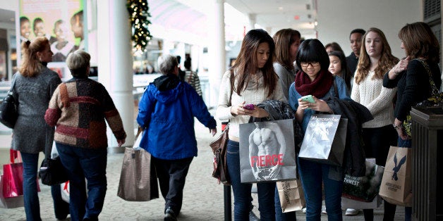 BRAINTREE, MA - NOVEMBER 23: Shoppers wait in line outside of a Hollister store during Black Friday sales at the South Shore Plaza on November 23, 2012 in Braintree, Massachusetts. Black Friday, the start of the holiday shopping season, has traditionally been the busiest shopping day in the United States. (Photo by Allison Joyce/Getty Images)