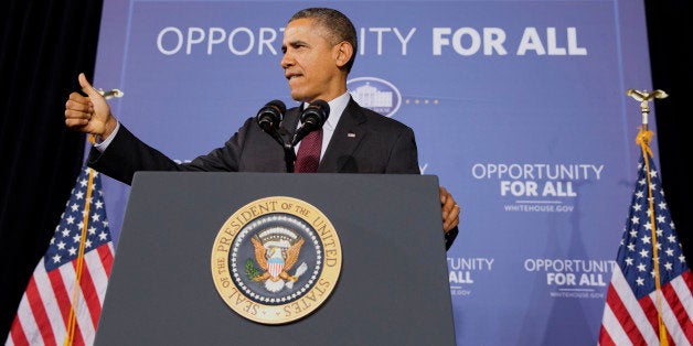 President Barack Obama makes the thumbs up sign as he ends a speech about his ConnetED goal of connecting 99% of students to next generation broadband and wireless technology within five years, Tuesday, Feb. 4, 2014, at Buck Lodge Middle School in Adelphi, Md. (AP Photo/Jacquelyn Martin)