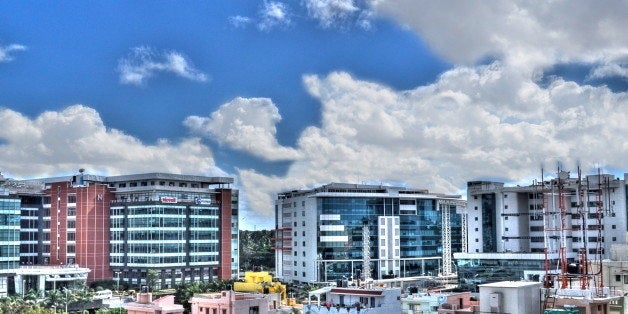 This is Bagmane Tech Park, Bangalore. The view is from the terrace of my apartment. My first attempt at HDR. Not sure whether the clouds are looking nice or bad :)