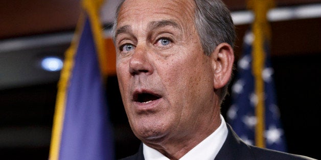 House Speaker John Boehner of Ohio meets with reporters on Capitol Hill in Washington, Thursday, Dec. 4, 2014. Just days before government funding expires, House Republican leaders are trying to strike a balance between the conservatives determined to stop President Barack Obamaâs immigration order and other lawmakers just as determined to avoid another politically damaging shutdown. (AP Photo/J. Scott Applewhite)