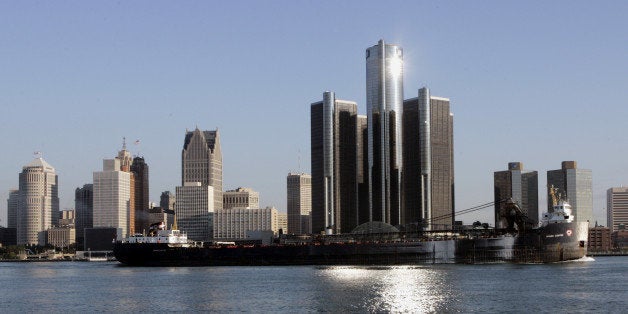 FILE - In this June 14, 2006 file photo, the Agawa Canyon ship passes the General Motors world headquarters and the Detroit skyline. General Motors' top executive said Monday, May 11, 2009, bankruptcy is becoming more probable but there is still hope that the company can restructure and avoid court protection. (AP Photo/Carlos Osorio, file)