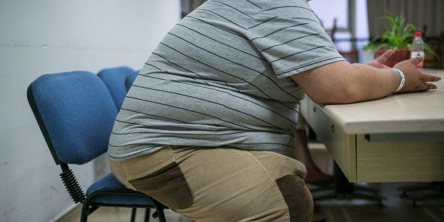 HANGZHOU, CHINA - SEPTEMBER 02: (CHINA OUT) A 200 kg man decides to do weight loss surgery on September 2, 2014 in Hangzhou, China. A 180-cm-tall 200-kg-weigh man with a waistline of over 155 cm has decided to do weight loss surgery due to a fat colleague died of obstructive sleep apnea syndrome caused by obesity. (Photo by ChinaFotoPress/ChinaFotoPress via Getty Images)