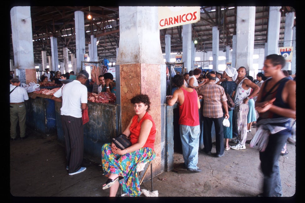 1999 - Cubans shop in one of Havana's main pesos food market Quatro Caminos in Havana. The Cuban economy was on the verge of 