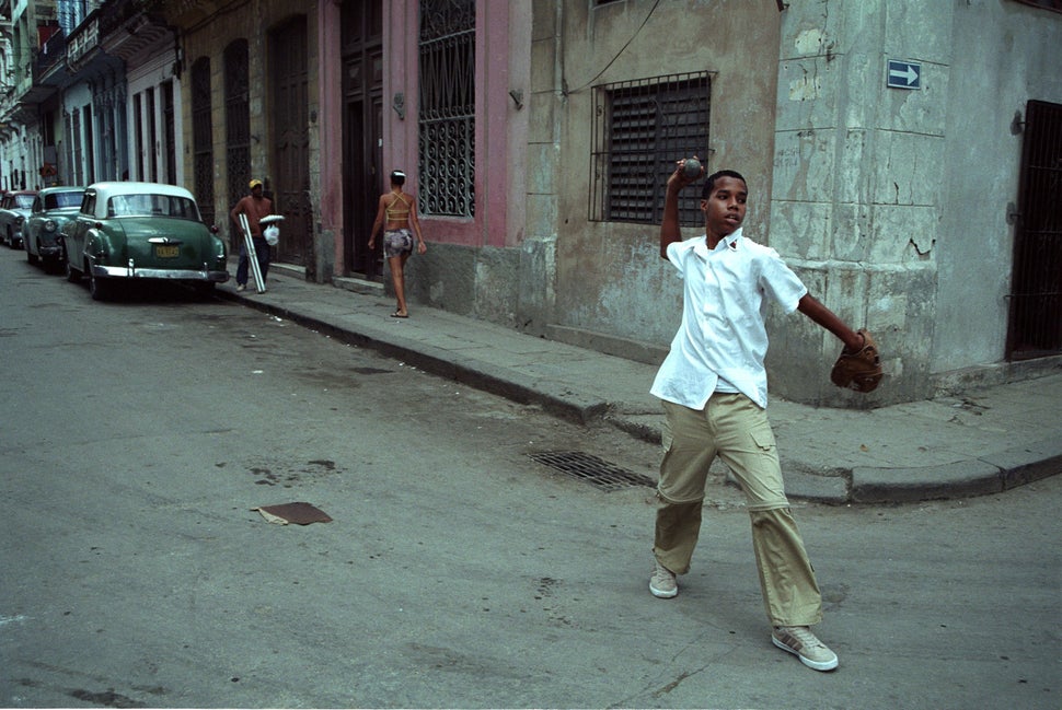 2003 - A young Cuban plays baseball in the streets of Havana. The normalization of relations with Cuba could eventually cause