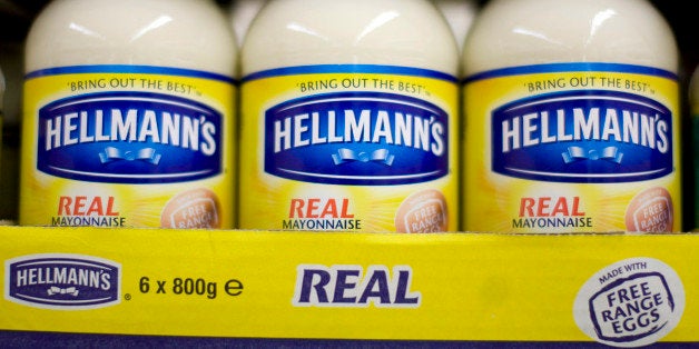 Jars of Hellmann's mayonnaise, produced by Unilever Plc., stand on display at a supermarket in London, U.K., on Friday, July 9, 2010. Unilever, the world's second-largest maker of consumer-products may receive a bid for its Italian frozen-food business, Findus Italy, from private equity group Lion Capital, the Financial Times said, citing unidentified people close to the process. Photographer: Chris Ratcliffe/Bloomberg via Getty Images