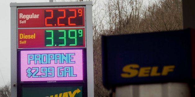 The price of regular unleaded and diesel fuels are displayed on a sign at a Sunoco Inc. gas station in Rockbridge, Ohio, U.S., on Wednesday, Dec. 17, 2014. Retail gasoline prices have fallen about 24% this year, yet crude oil and wholesale gasoline price declines have been more profound, highlighting an inconsistent relationship. Photographer: Ty Wright/Bloomberg via Getty Images