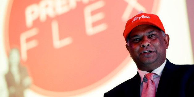 AirAsia Group Chief Executive Officer Tony Fernandes speaks during a press conference in Kuala Lumpur, Malaysia, Monday, Aug. 11, 2014. AirAsia launched its new "Premium Flex" services providing benefits to travellers. (AP Photo/Vincent Thian)
