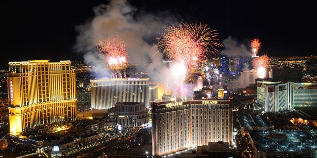 In this photo provided by the Las Vegas News Bureau, fireworks burst over the Las Vegas Strip at midnight on New Year's 2014, as seen from Trump International Hotel Las Vegas on Jan 1, 2014. Las Vegas officials expect to welcome approximately 335,000 visitors for the holiday. (Photo/Las Vegas News Bureau, Darrin Bush)