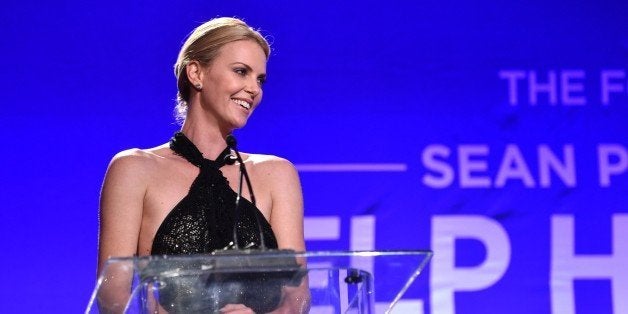 Charlize Theron speaks on stage at Sean Penn And Friends "Help Haiti Home" Gala - Show at the Montage Hotel on Saturday, Jan. 10, 2015 in Beverly Hills, Calif. (Photo by John Shearer/Invision/AP)