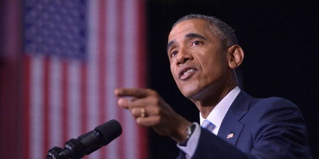 US President Barack Obama speaks about the attacks in France, saying 'the United States stands with you' at Pellissippi State Community College in Knoxville, Tennessee on January 9, 2015. AFP PHOTO/MANDEL NGAN (Photo credit should read MANDEL NGAN/AFP/Getty Images)