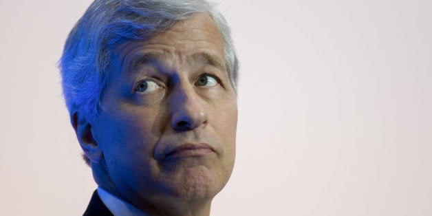 James 'Jamie' Dimon, chief executive officer of JPMorgan Chase & Co., listens during an Institute of International Finance pa