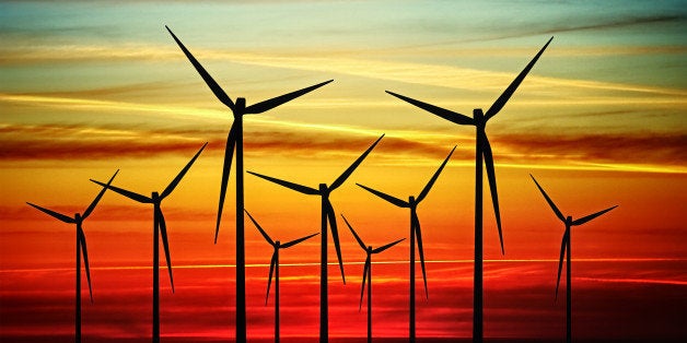 wind turbines at sunset