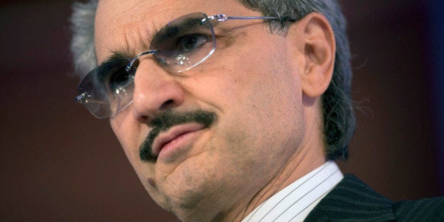 Prince Alwaleed Bin Talal, Saudi billionaire and founder of Kingdom Holding Co., listens at the Bloomberg Year Ahead: 2014 conference in Chicago, Illinois, U.S., on Wednesday, Nov. 20, 2013. Alwaleed said President Barack Obama lacks a 'comprehensive and coherent foreign policy' toward the Arab world. Photographer: Daniel Acker/Bloomberg via Getty Images