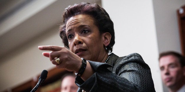 NEW YORK, NY - APRIL 28: Loretta Lynch, United States Attorney for the Eastern District of New York, speaks at a press conference to announce a 20-count indictment against U.S. Representative Michael Grimm (R-NY, 11th District) on April 28, 2014 in New York City. Grimm's indictments include wire fraud, mail fraud, conspiring to defraud the United States, impeding the Internal Revenue Service, hiring and employing unauthorized aliens, and health care fraud. (Photo by Andrew Burton/Getty Images)