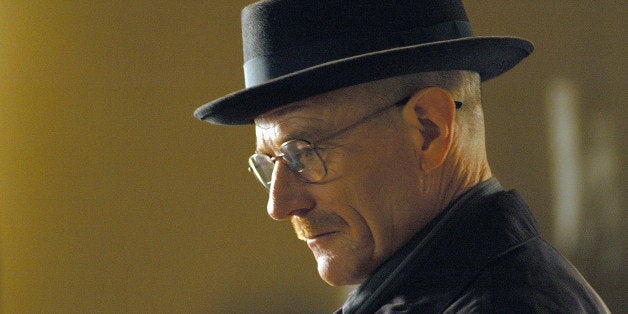 This image released by AMC shows Walter White, played by Bryan Cranston, wearing a Bollman 1940âs pork pie hat in a scene from the second season of "Breaking Bad." Cranston was nominated for a Golden Globe for best actor in a drama series for his role in the series on Thursday, Dec. 12, 2013. The 71st annual Golden Globes will air on Sunday, Jan. 12. (AP Photo/AMC, Ursula Coyote)