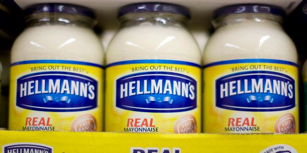 Jars of Hellmann's mayonnaise, produced by Unilever Plc., stand on display at a supermarket in London, U.K., on Friday, July 9, 2010. Unilever, the world's second-largest maker of consumer-products may receive a bid for its Italian frozen-food business, Findus Italy, from private equity group Lion Capital, the Financial Times said, citing unidentified people close to the process. Photographer: Chris Ratcliffe/Bloomberg via Getty Images